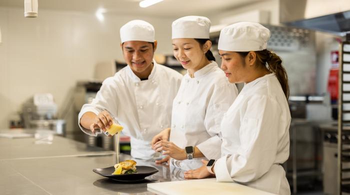 Students working in kitchen