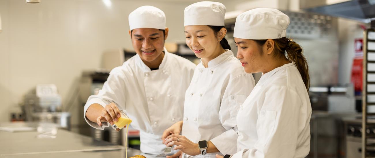 Students working in kitchen